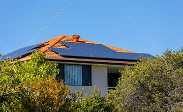 Solar panels on a house roof facing in two different directions