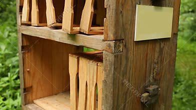 Empty old wooden beehive on frame form in