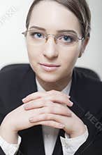 Charming young business woman smiling confidently