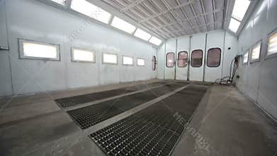 Simple paint-spraying booth for cars at Service