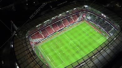 Soccer teams play on field during match of UEFA