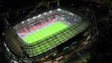 Soccer teams play on field during match of UEFA