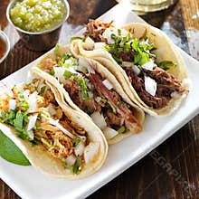 Authentic mexican barbacoa, carnitas and chicken tacos