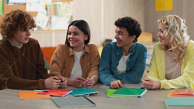 Caucasian four friends students teenagers pupils students teens girls boys guys women men female male together sitting