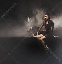 Young witch making the witchcraft in the dungeon