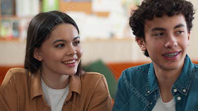 Moving shot close up happy smiling laugh Caucasian four friends students teenagers students teens girls boys guys women