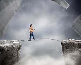 Woman walking on pages.