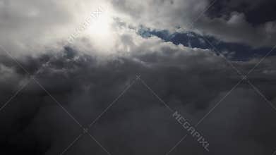 Endless flight through clouds. Daytime, thick dense clouds, first person view