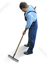 Gardener - worker in working clothes, raking the garden