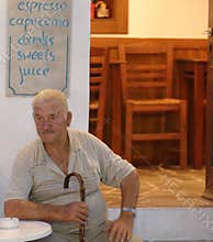 Greek man at tavern