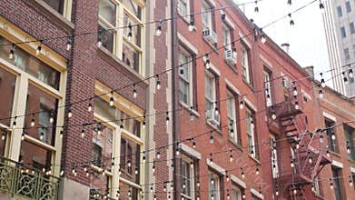 New York City Manhattan building architecture. Red brick house exterior. Real estate property, USA.