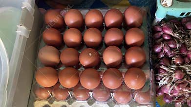 Close up fresh egg tray chicken box at community market service.