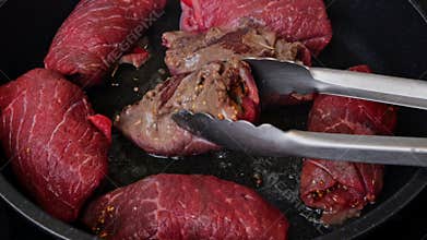Preparing beef roulades stuffed with mustard, onions, pickled cucumber and bacon. ?ooking process. Recipe