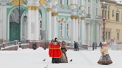Russia, Saint Petersburg, 30 December 2023 - Actors in the role of Peter the Great and Catherine the Great walk across