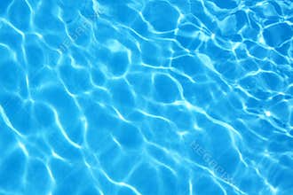 Rippled pattern of clean water in blue swimming pool