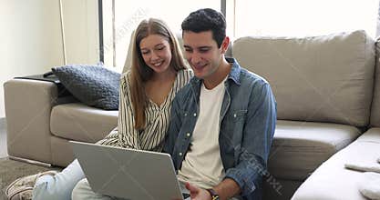 Couple in love spend weekend time leisure on-line using laptop