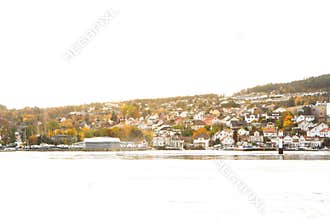 Sunset view of waterfront Brevik city.