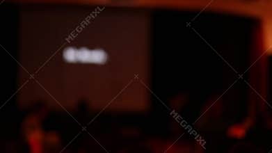 Defocused black and white cinema on screen in