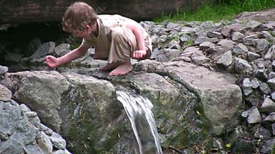 Child boy play on small