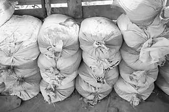 Fertilizer sack manure organic ,Chemical-resistant sandbags , hemp sack at farm garden.