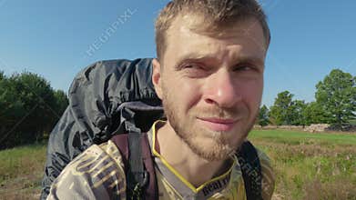 Wandering through Sunlit Sands: Hiker's Quest in Arid Wilderness