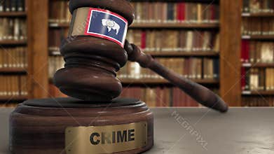 Wyoming Flag on Judge Gavel or Hammer in Court with Word Crime. Crime in State Concept