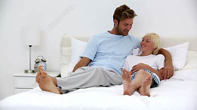 Father and son chatting together