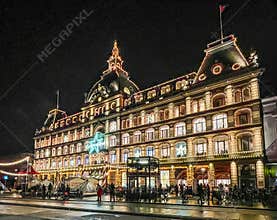Magasin du Nord front facade during winter solstice night, Copenhagen, Denmark