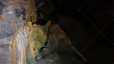 Ancient natural rock markings on limestone cave wall in Malaysia