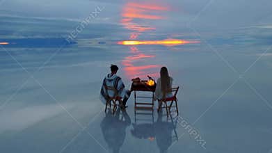 Sunset Over the Salt Flats of Bolivia: A Serene Reflection of Nature's Beauty