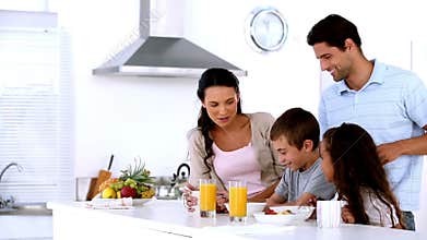 Family having breakfast together