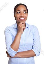 Thinking african woman in a blue shirt