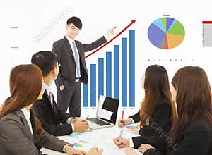 Business man giving a presentation about marketing sales