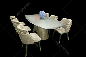 Modern dining table and chairs set with a vase on display in a black background setting