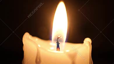 Close-up of Candle Burning Down and Wax Melting