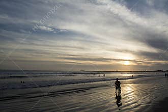 Sunset Over Pacific Ocean in Riviera Nayarit Silhouettes on a Beach at Dusk
