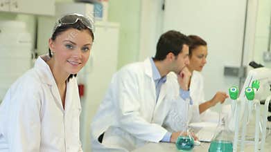 Chemistry students working on an experiment in the lab