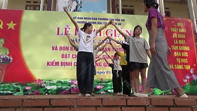 Vietnamese schoolgirls are practicing performing arts to prepare for the opening day of the new school year