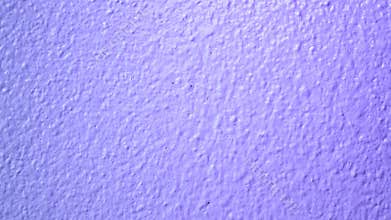 cement close up video of color shades blending into a smooth gradient abstract background.