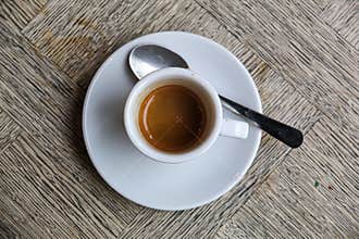 Espresso Cup and Saucer on Wooden Table