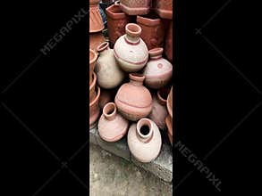 Traditional Terracotta Water Storage Pots in a Pottery Shop for Sale
