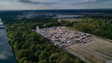 Berlin funfair with carnival rides and stalls Smooth aerial view flight drone