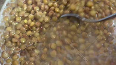 Macro shot of boiled lentils.