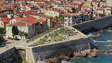 Aerial drone view of Antibes Old Town with terraco