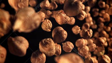 Chickpeas fly and fall. Filmed on a high-speed camera at 1000 fps.