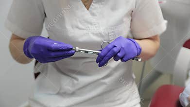 Dentist assembling dental syringe for anesthesia injection