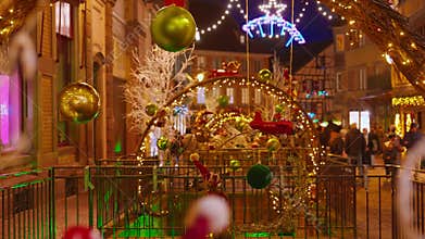 Colmar, France - 3.12.2025: Christmas and New Year street decorations at evening. Christmas market Colmar, Alsace