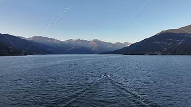 Quiet dawn view showing silhouettes and expansive reflective surface
