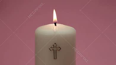 Catholic candle burning and being blown out