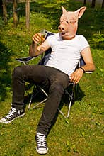 Man pig celebrating
